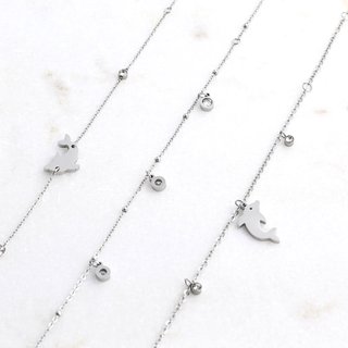 Pulseiras de pé aço golfinhos GB