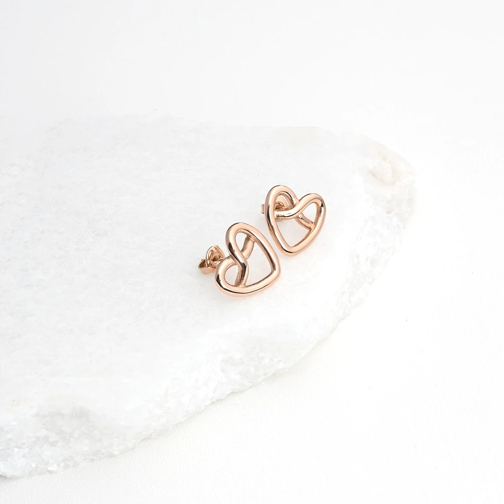 Boucles d\'oreilles en acier cœur entrelacé GB