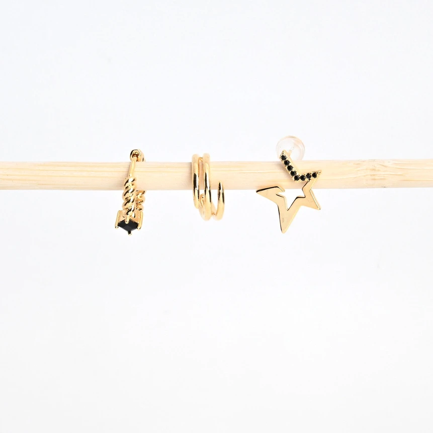 Conjunto pendientes baño de oro estrella negra GB