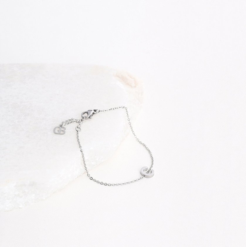 Pulseira em aço letra GB