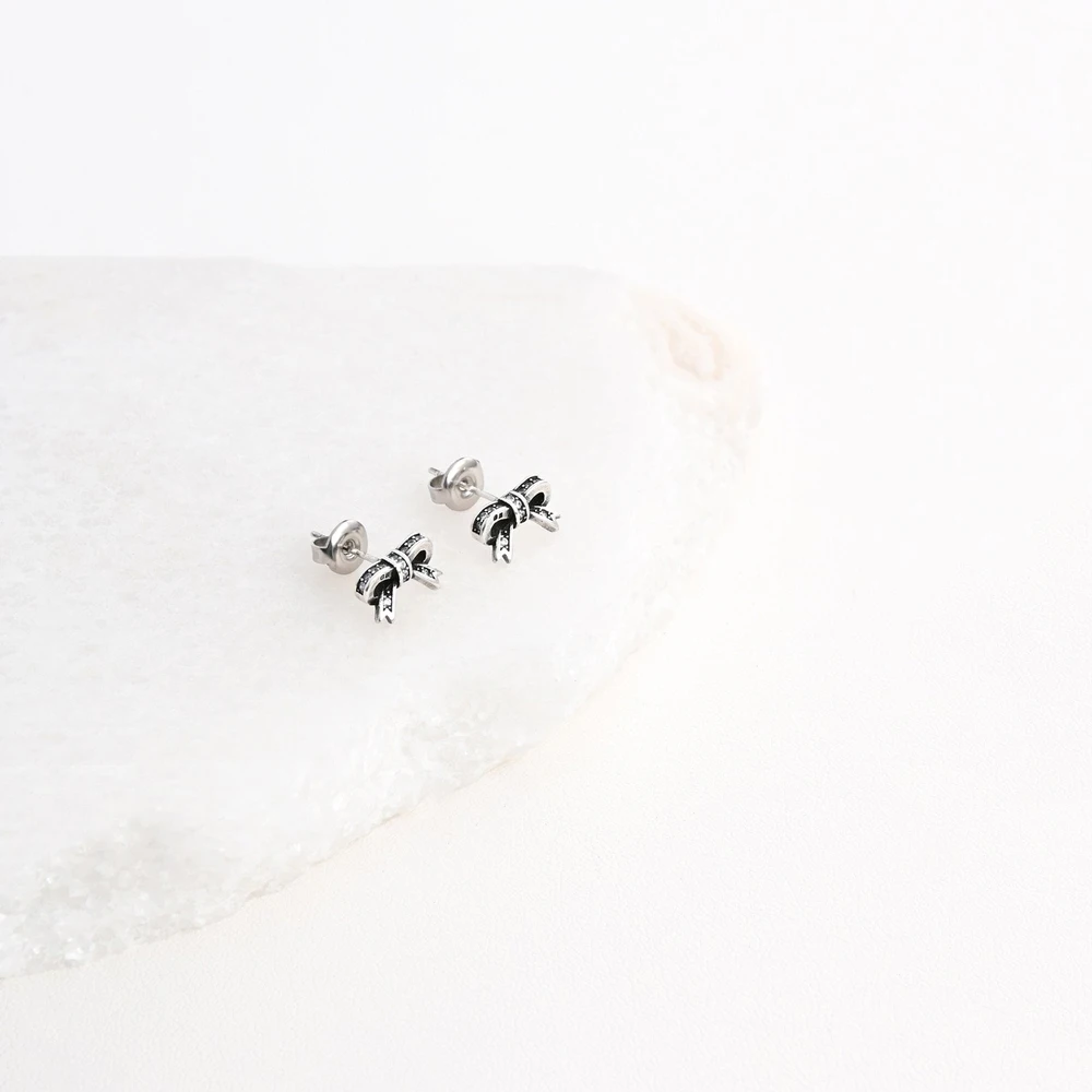 Boucles d\'oreilles en rhodium nœud GB