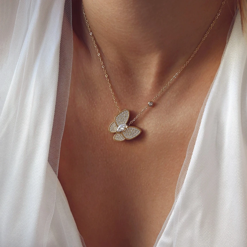 Collana in acciaio farfalla e luminosa GB