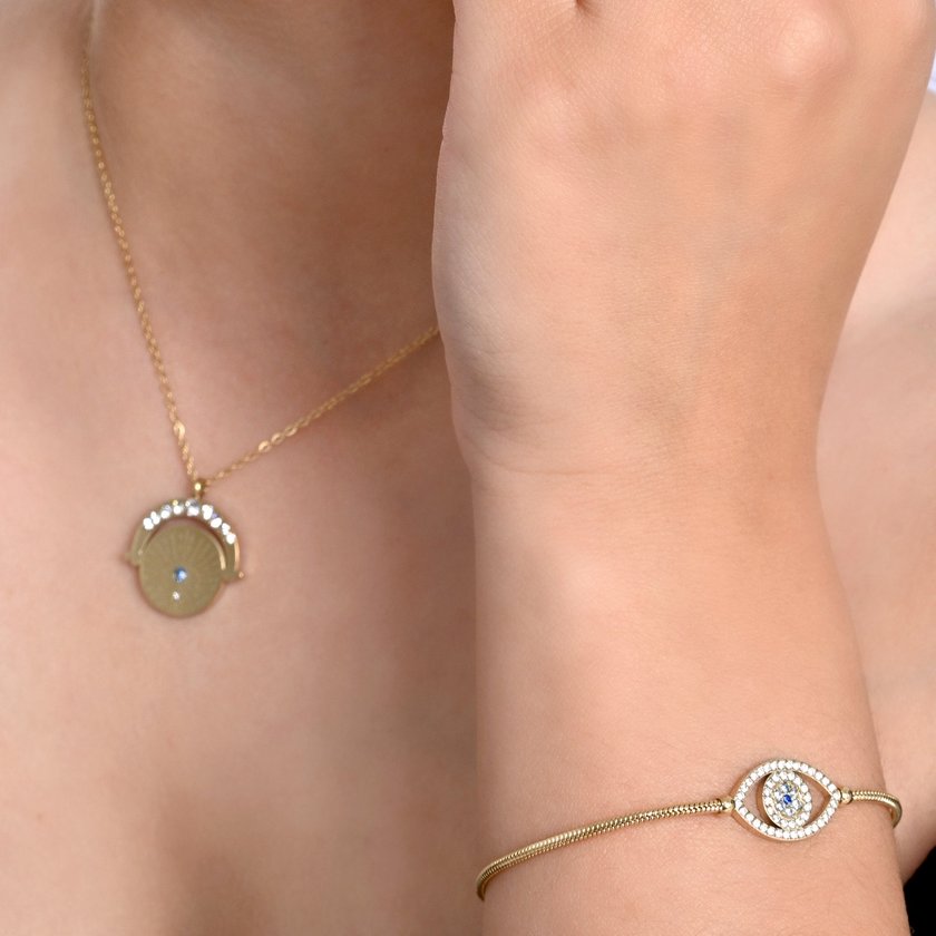 Pulseira em aço e zircônias olho azul GB