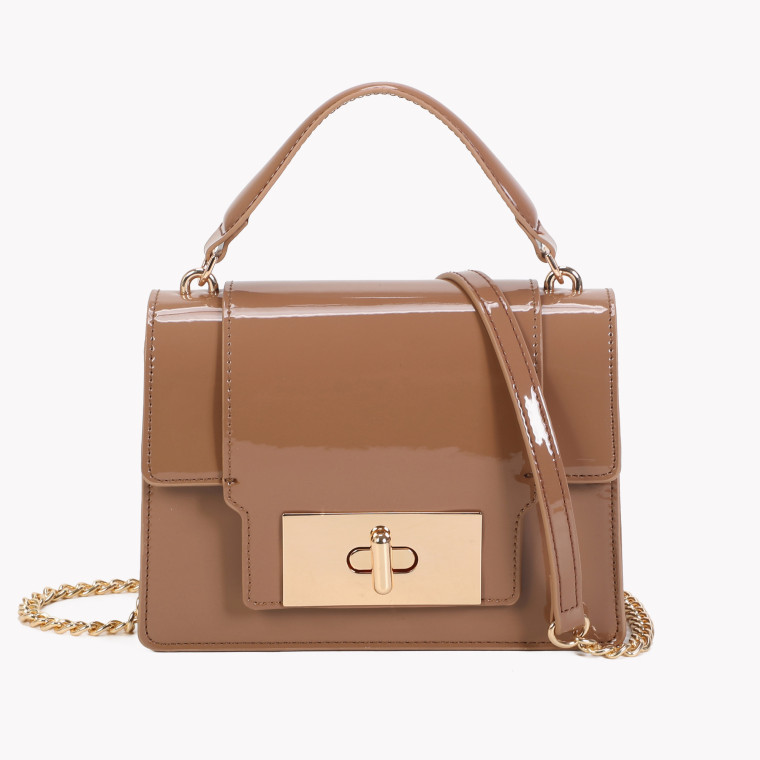 Crossbody bag with flap closure and GB details