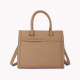 Tote style bag with front closure and GB detail