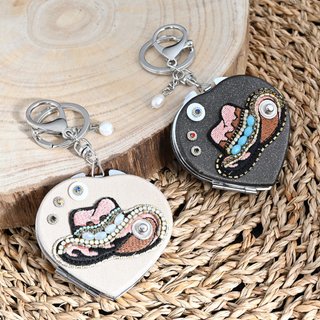 Heart-shaped keychain with mirror
