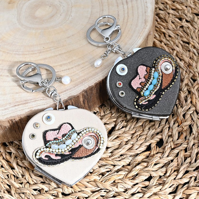 Heart-shaped keychain with mirror