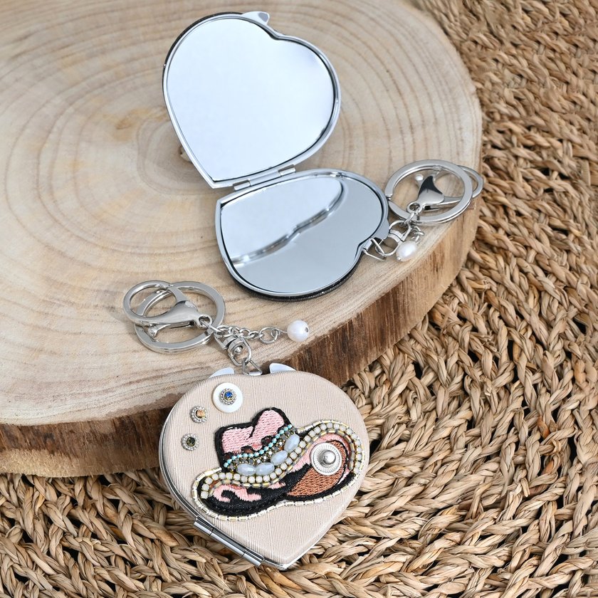Heart-shaped keychain with mirror