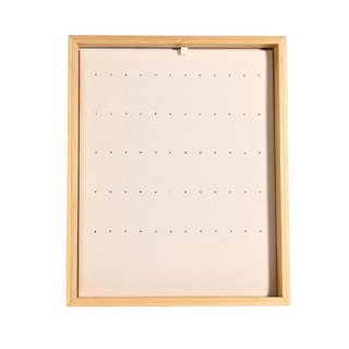 Présentoir beige pour boucles d'oreilles diverses