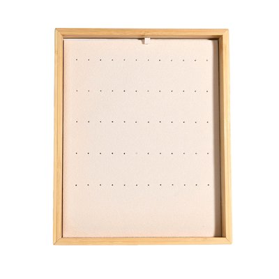 Beige display for assorted earrings