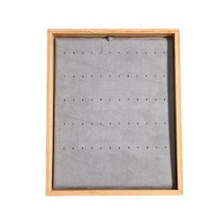 Beige display for assorted earrings