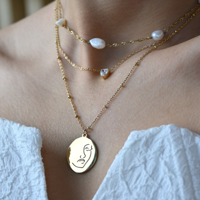 Delicate smooth necklace with face