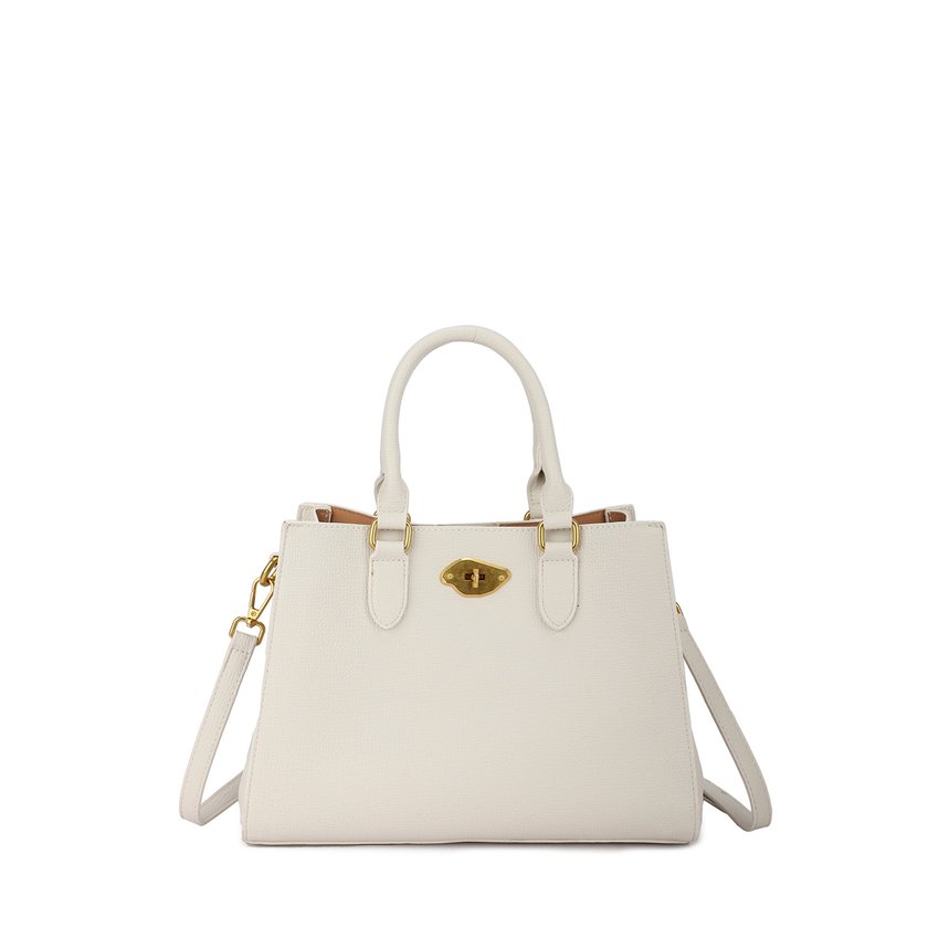 Handbag with irregular clasp