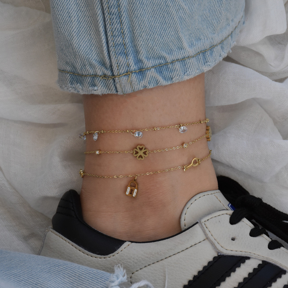 Bracciale piede acciaio trifogli GB