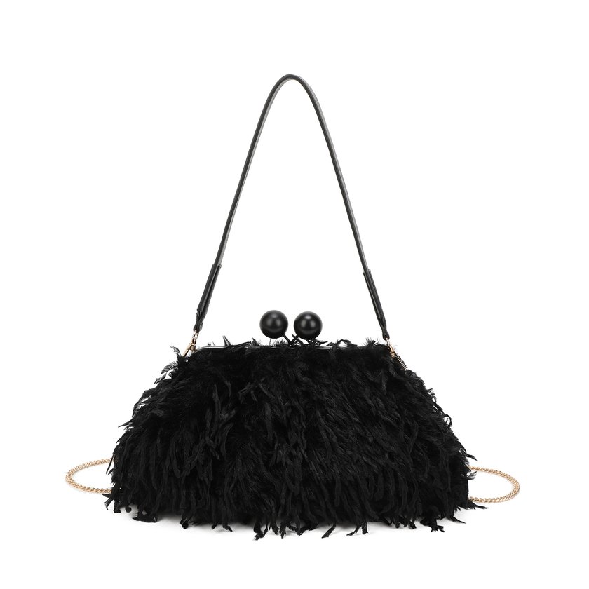 Shoulder bag with fur and feathers