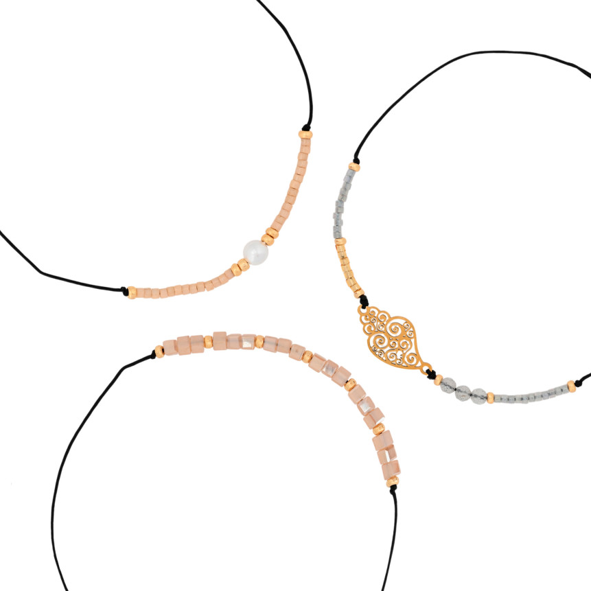 Ensemble de trois bracelets en acier beige