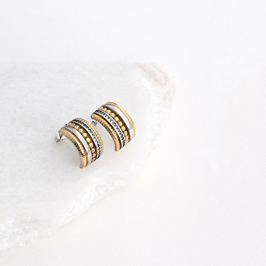 Brincos em aço bicolor com zircônias