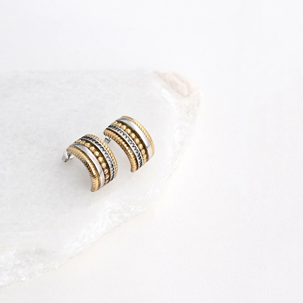 Brincos em aço bicolor com zircônias