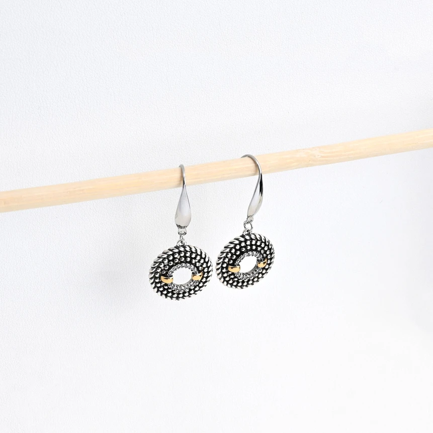 Brincos em aço bicolor com zircônias